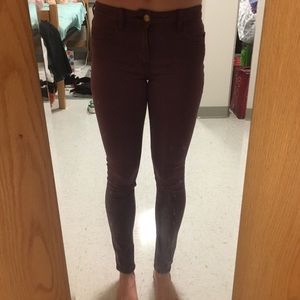 Maroon American Eagle jeans.